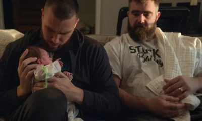 Travis Kelce surprises his big brother, Jason Kelce, with a visit just hours after Jason’s wife delivers their fourth baby.