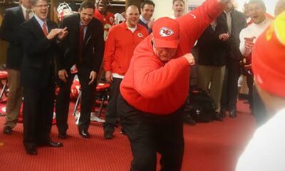 Breaking news: The Kansas City Chiefs celebrate as Andy Reid signs a contract renewal.