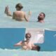 Travis Kelce faces the risk of being banned from playing after a series of inappropriate images with his hot girlfriend, Taylor Swift, getting cozy in the water...